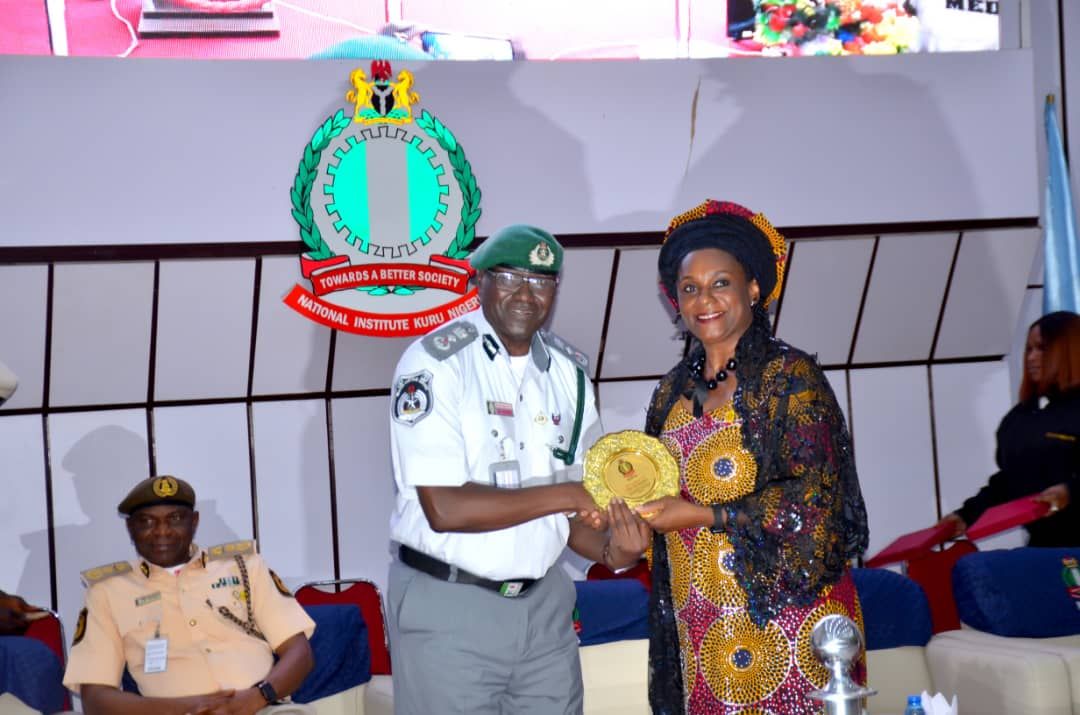 DCG SA Bomai Receiving Souvenir From NIPSS